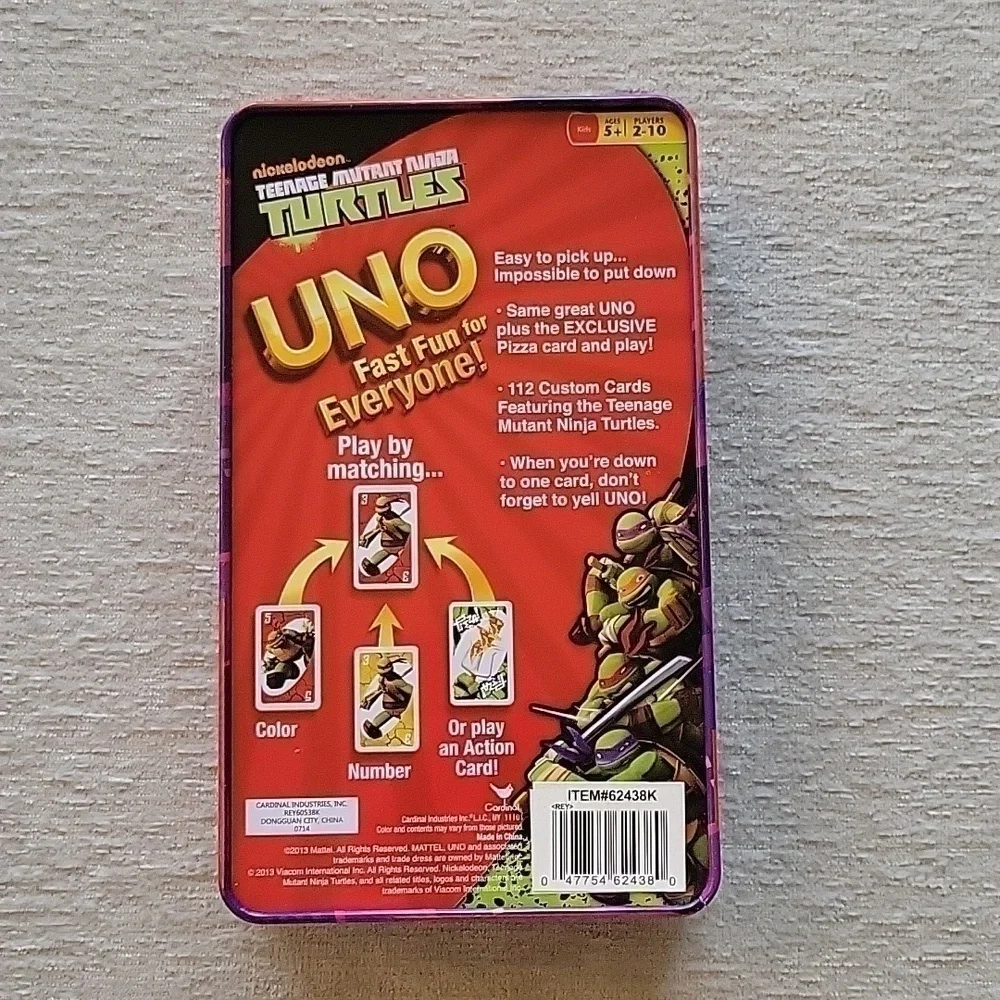 Uno Teenage Mutant Ninja Turles card game in storage tin.  Great condition.